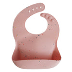Load image into Gallery viewer, Mushie Silicone Baby Bib - Happyness
