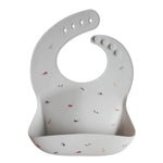 Load image into Gallery viewer, Mushie Silicone Baby Bib - Happyness
