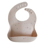 Load image into Gallery viewer, Mushie Silicone Baby Bib - Happyness
